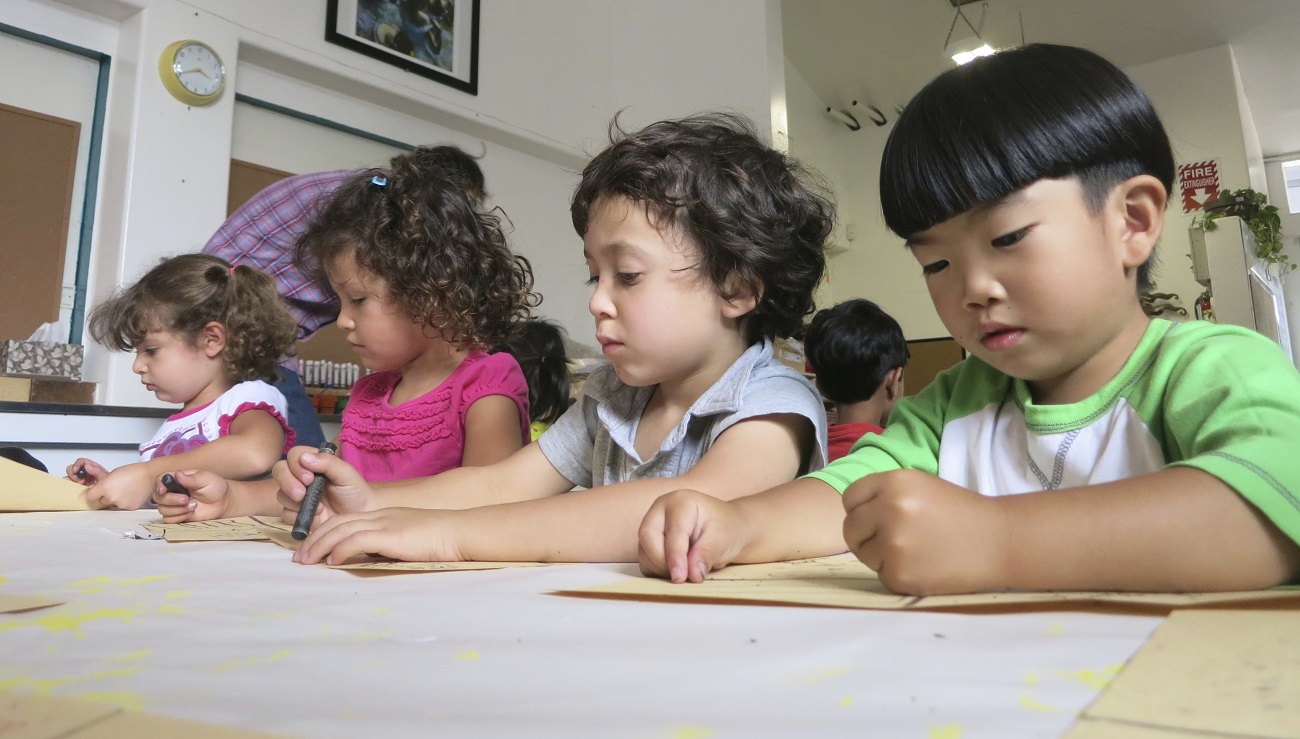 Learning Pathways children exploring hands-on preschool materials